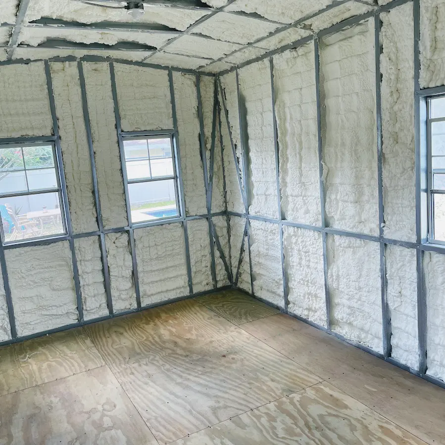 Closed-cell spray foam insulation applied to wall cavities in a residential project in Lemont